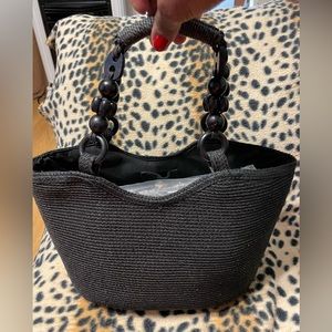 Black straw handbag